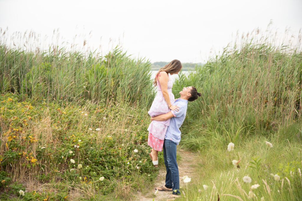 couple dance in the tall grasses at Sagg Main Beach in the Hamptons