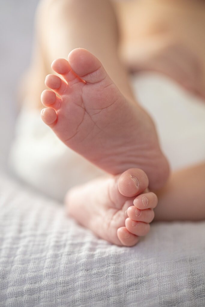 Close up photo of newborn toes at home in Greenwich, CT